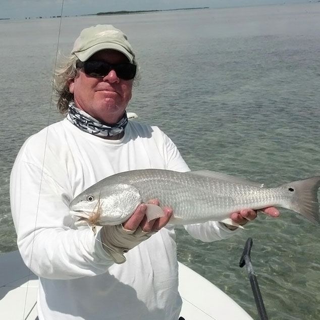 captain kerry with redfish